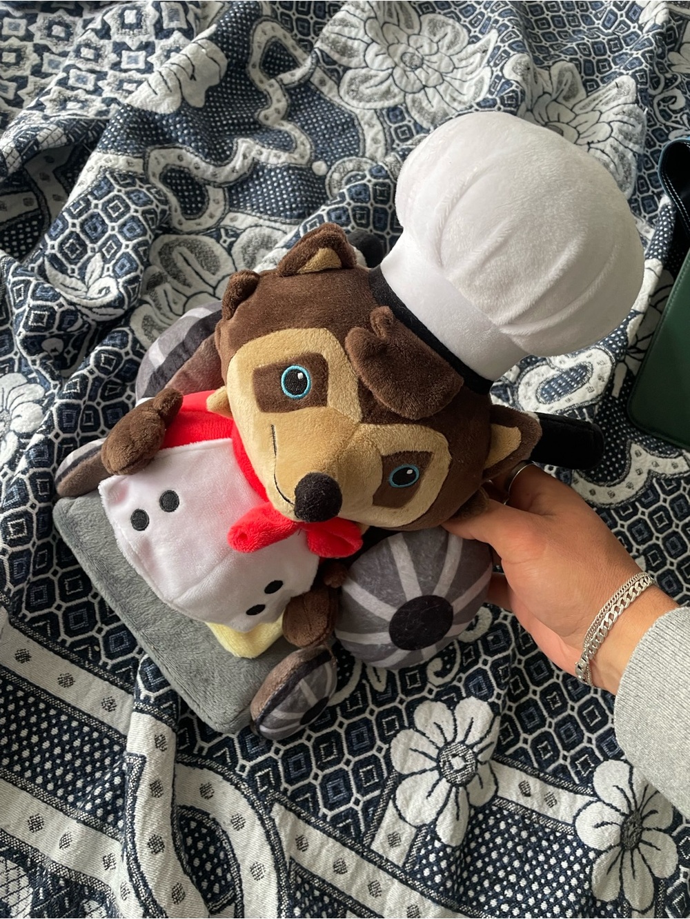 Plush Racoon chef from the game overcooked